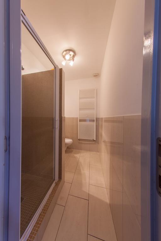 Mansard Apartment Antonovicha 4 Kiev Habitación foto